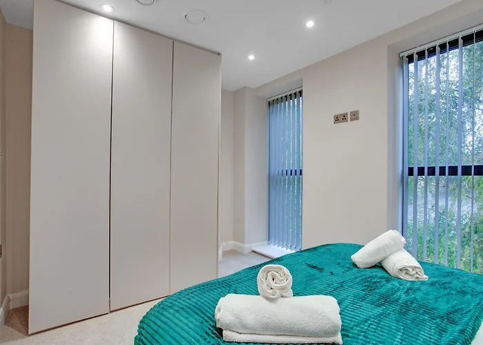 Modern City Center Oasis With Lush Green Decor Ideal For Business Or Leisure